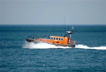 RNLI Lifeboat attending an emergency in North Wales. Foto de stock - Super Valor sin royalties y Suscripción, Código: 400-04971237