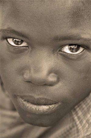 photographic portraits poor people - An african boy. Stock Photo - Budget Royalty-Free & Subscription, Code: 400-04971398