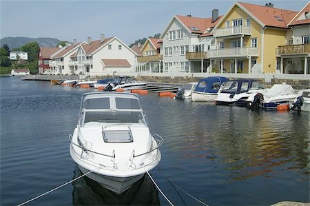 farsund - Fast day-cruiser and water-front houses in Farsund, a small town on the south coast of Norway Stock Photo - Budget Royalty-Free & Subscription, Code: 400-04971865