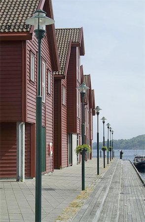 farsund - Traditional style, wooden shophouses on the quay in Farsund on the south coast of Norway Stock Photo - Budget Royalty-Free & Subscription, Code: 400-04971905