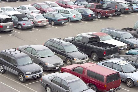 sparky2000 (artist) - A parking lot crammed with cars. All trademarks have been removed. Photographie de stock - Aubaine LD & Abonnement, Code: 400-04971923