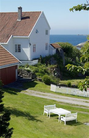 farsund - White, wooden house in a garden near the sea in Loshavn near Farsund in Vest-Agder, Norway. Stock Photo - Budget Royalty-Free & Subscription, Code: 400-04972111