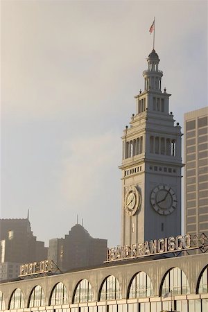 san francisco ferry building - The clock tower of San Francisco's Ferry Building greets morning commuters with the time. Stock Photo - Budget Royalty-Free & Subscription, Code: 400-04972159