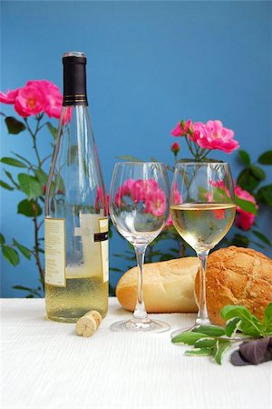 White wine with glasses on blue background Stock Photo - Budget Royalty-Free & Subscription, Code: 400-04972641
