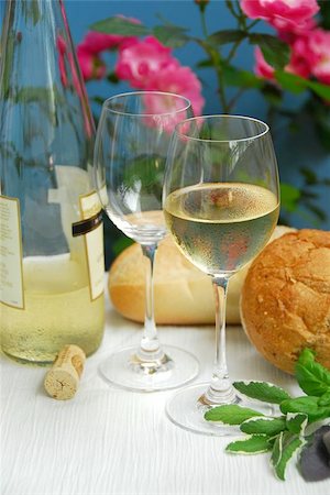 Table setting with chilled white wine and glasses Stock Photo - Budget Royalty-Free & Subscription, Code: 400-04972712