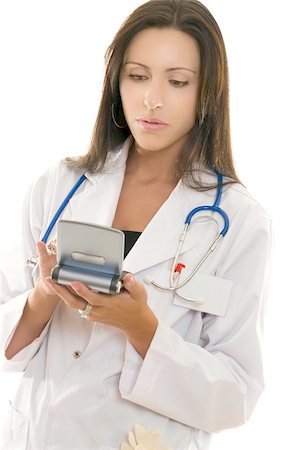 simsearch:400-04508758,k - Healthcare professional retirieving medical information on a portable device Foto de stock - Super Valor sin royalties y Suscripción, Código: 400-04972947