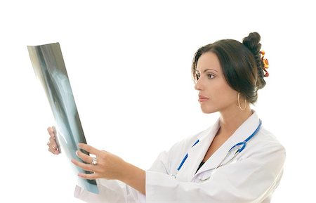 simsearch:400-04508758,k - Woman medical professional analyzing a patient's xray, example, radiology, oncology, disease, prevention, diagnosis. Foto de stock - Super Valor sin royalties y Suscripción, Código: 400-04972943