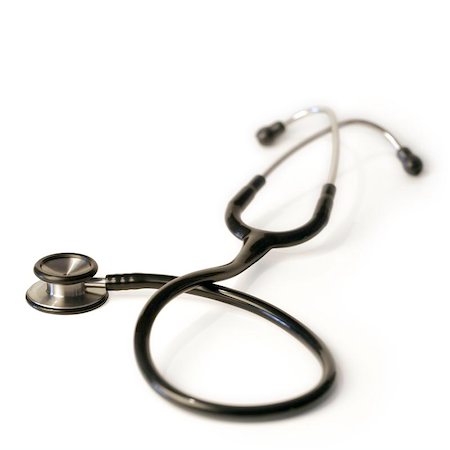 simsearch:400-05052842,k - A shallow depth-of-field image of a stethoscope on white background. Photographie de stock - Aubaine LD & Abonnement, Code: 400-04973545
