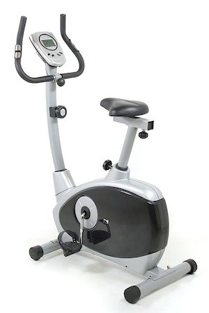 simsearch:400-04027186,k - Stationary bicycle. Gym machine. Health and fitness object  over white background. I´ve got more Stockbilder - Microstock & Abonnement, Bildnummer: 400-04973882