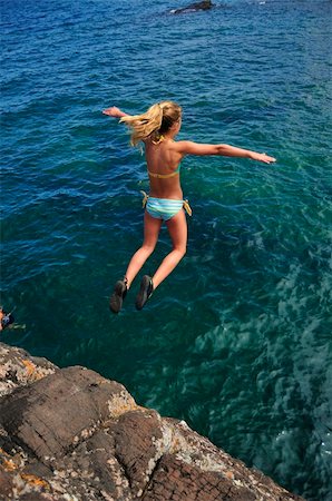 Kid Diving Off Black Rock Presque Isle Park Marquette Michigan Stock Photo - Budget Royalty-Free & Subscription, Code: 400-04984050