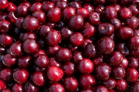 Sweet cherry - very tasty and useful berry. Food background of sweet cherry Stockbilder - Microstock & Abonnement, Bildnummer: 400-04984085