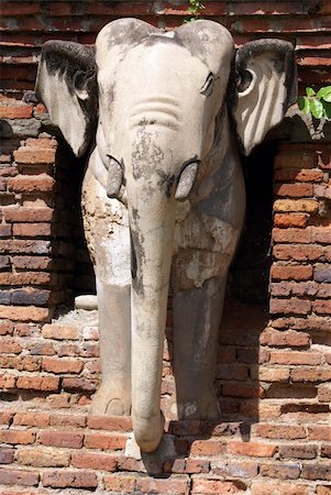 elephant with temple - White elephant and red brick wall in old Sukhotai, Thailand Stock Photo - Budget Royalty-Free & Subscription, Code: 400-04984310