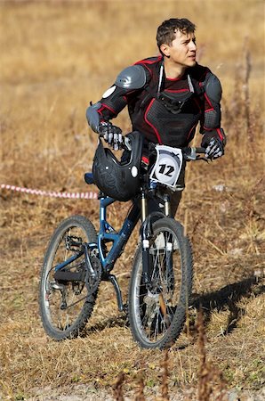 Tired sportsman on race - ascent to place of the start Stock Photo - Budget Royalty-Free & Subscription, Code: 400-04984345