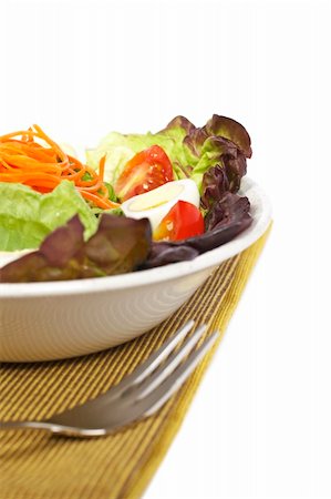 simsearch:400-04053976,k - Salad with lettuce, tomatoes, carrot, egg and beet. Shallow depth of field Fotografie stock - Microstock e Abbonamento, Codice: 400-04984785