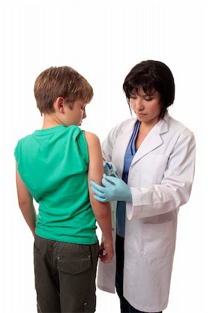 A child receives a vaccination from a doctor Stock Photo - Budget Royalty-Free & Subscription, Code: 400-04984788