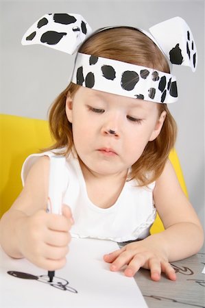 female dalmatian - The small girl with dalmatian mask sketches the dog Stock Photo - Budget Royalty-Free & Subscription, Code: 400-04984995