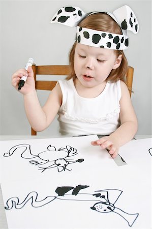 female dalmatian - The small girl with dalmatian mask sketches the dog Stock Photo - Budget Royalty-Free & Subscription, Code: 400-04984993