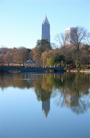 dbvirago (artist) - A skyscraper reflected in city park lake Fotografie stock - Microstock e Abbonamento, Codice: 400-04985010