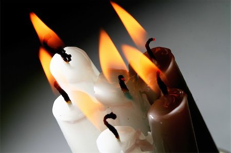 sacred candles in dark on black background Stock Photo - Budget Royalty-Free & Subscription, Code: 400-04985221