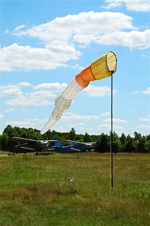 simsearch:400-07933124,k - Windsock indicating winds on airfield Stock Photo - Budget Royalty-Free & Subscription, Code: 400-04985298