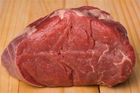 prime rib - raw meat on a wooden chopping board Stock Photo - Budget Royalty-Free & Subscription, Code: 400-04985652