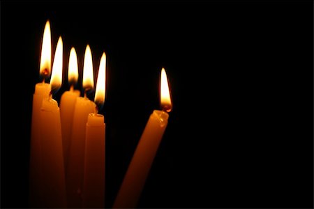 sacred candles in dark on black background Stock Photo - Budget Royalty-Free & Subscription, Code: 400-04985769
