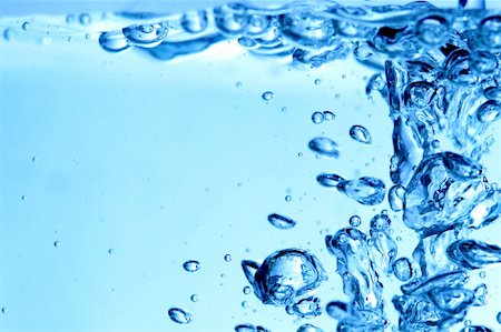 blue water bubbles macro close up Foto de stock - Super Valor sin royalties y Suscripción, Código: 400-04986441