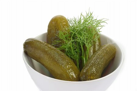 pickling gherkin - Pickled cucumber with fresh dill - isolated on white background Stock Photo - Budget Royalty-Free & Subscription, Code: 400-04986784