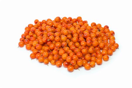 Pile of sea buckthorn berries isolated on the white background Stock Photo - Budget Royalty-Free & Subscription, Code: 400-04987302