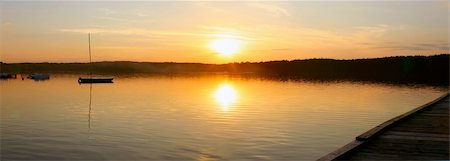 romantic dock landscape - beautiful panoramic view of a sunset over a lake Stock Photo - Budget Royalty-Free & Subscription, Code: 400-04987854