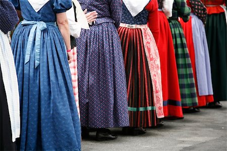Group of folk dancer women in their colorful old dresses. Shallow DOF. Focus on left blue dress. Stock Photo - Budget Royalty-Free & Subscription, Code: 400-04987985