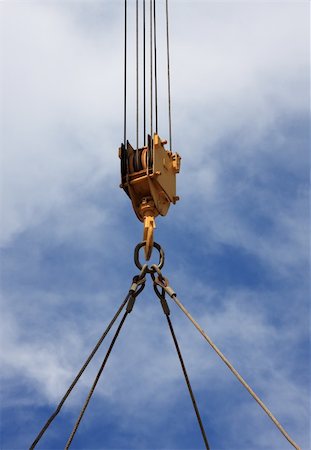 simsearch:400-04805936,k - Close up of a crane hook lifting something Photographie de stock - Aubaine LD & Abonnement, Code: 400-04988058