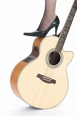 Leg in stiletto on top of guitar Stock Photo - Budget Royalty-Free & Subscription, Code: 400-04988152