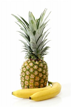 simsearch:400-04315300,k - Pineapple with bananas on white background Foto de stock - Super Valor sin royalties y Suscripción, Código: 400-04988700