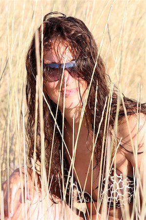 Young woman near of beach in the sea Stock Photo - Budget Royalty-Free & Subscription, Code: 400-04989055