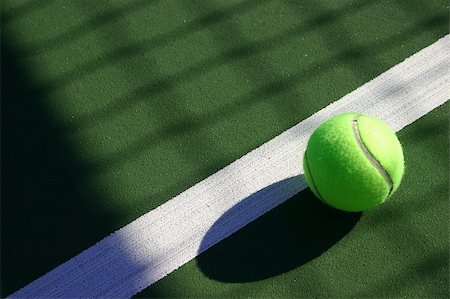 Tennis ball on the white line. Stock Photo - Budget Royalty-Free & Subscription, Code: 400-04981244