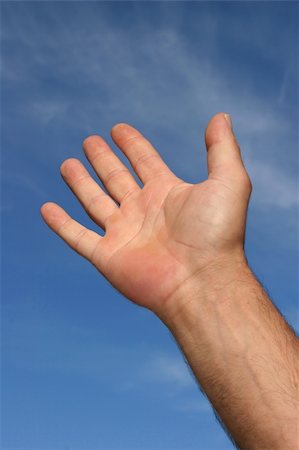 simsearch:400-04662543,k - Hand of a man reaching towards a blue sky Stock Photo - Budget Royalty-Free & Subscription, Code: 400-04981518