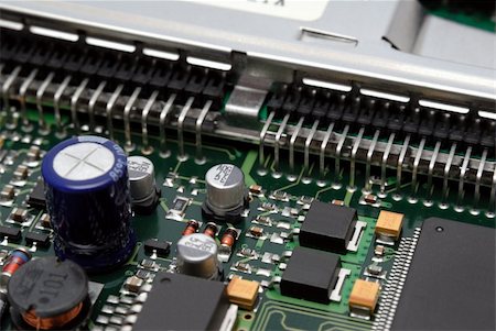 simsearch:400-03966982,k - The printed-circuit-board with computer chips resistors and condensers Stock Photo - Budget Royalty-Free & Subscription, Code: 400-04981917
