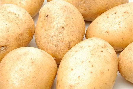 simsearch:400-06701002,k - Heap of potato isolated on the white background Stock Photo - Budget Royalty-Free & Subscription, Code: 400-04981931