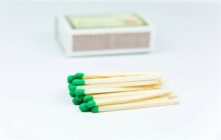 Green wooden matches over the box Stock Photo - Budget Royalty-Free & Subscription, Code: 400-04982804