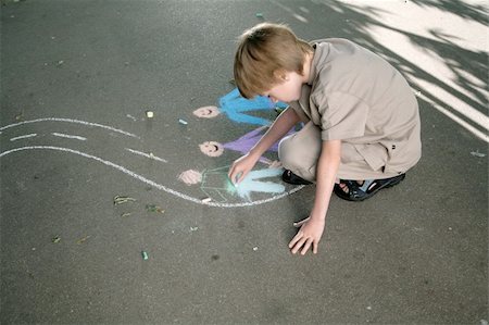 young bow drawing with chalk on pavement Stock Photo - Budget Royalty-Free & Subscription, Code: 400-04983708