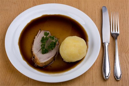 bavarian roast pork dish with potato dumpling Stock Photo - Budget Royalty-Free & Subscription, Code: 400-04983750