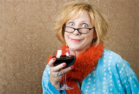 Woman with a big grin drinking red wine Foto de stock - Royalty-Free Super Valor e Assinatura, Número: 400-04983870