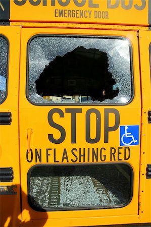 pictures of broken car windows - the back of an old and not in use school bus standing in a parking lot, with two broken windows Stock Photo - Budget Royalty-Free & Subscription, Code: 400-04983990