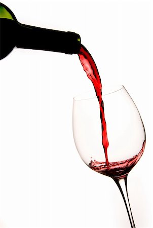 simsearch:400-04935153,k - Pouring a Glass of Red Wine with White Background Photographie de stock - Aubaine LD & Abonnement, Code: 400-04994545