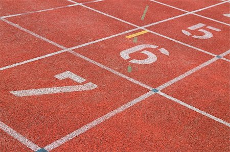 relay runner - Part of the starting lane of a race track Stock Photo - Budget Royalty-Free & Subscription, Code: 400-04995206