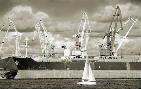 simsearch:400-05674261,k - Loading by coal of the cargo ship in the Riga port. Stock Photo - Budget Royalty-Free & Subscription, Code: 400-04995259