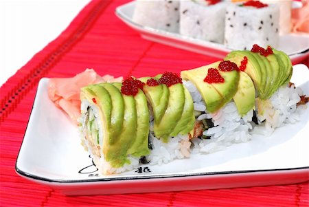 Green dragon sushi and maki combo on a small plate Foto de stock - Super Valor sin royalties y Suscripción, Código: 400-04995898