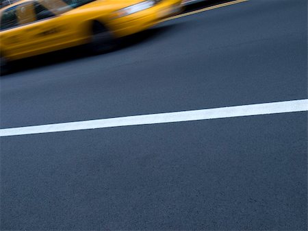 driving new york city street - A New York yellow cab in motion on the street. Stock Photo - Budget Royalty-Free & Subscription, Code: 400-04996088