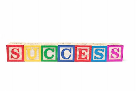 simsearch:693-06325253,k - Alphabet Blocks - Success on White Background Stock Photo - Budget Royalty-Free & Subscription, Code: 400-04996095